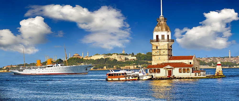 The Maiden's Tower Lighthouse at the mouth of the Bosphorus, looking towards the Blue Mosque, Hagia Sophia and the Topkapi Palace on Sarayburnu or Seraglio Point, from left, Istanbul, Turkey