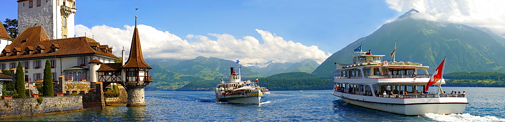 Ferries at Schloss Oberhofen Castle, Lake Thun, Bernese Oberland, Switzerland, Europe