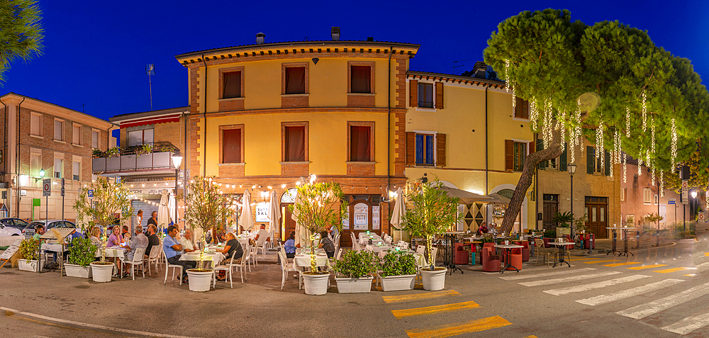 View of cafe in Borgo San Giuliano district in Rimini at dusk, Rimini, Emilia-Romagna, Italy, Europe