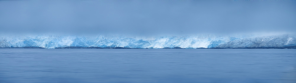 Arctic coast, fog, ocean. Ny-Alesund, Svalbard, Norway