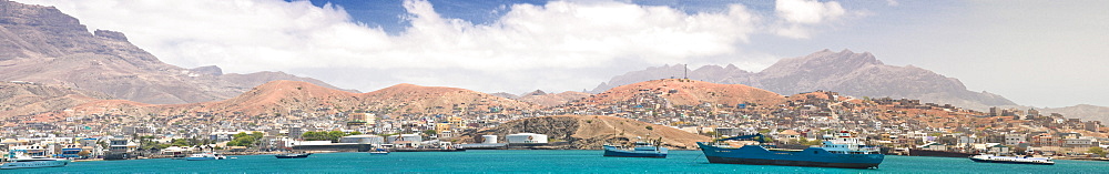 04/04/2009, Afternoon, Mindelo Harbour, Tug boat, Cargo ships with mindelo and surounding mountains. Mindelo, Mindelo Harbour, Sao Vicente Island. Cape Verde Islands