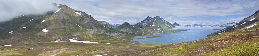 Mountain views and iced lake reflections, high ground, Bogoslov Island (Bering Sea) Russia, Asia 