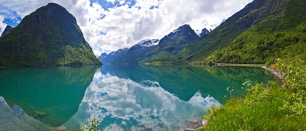 A panoramic view of the lake formed from water melting from the Briksdalsbreen glacier south of the small town of Olden in coastal Norway