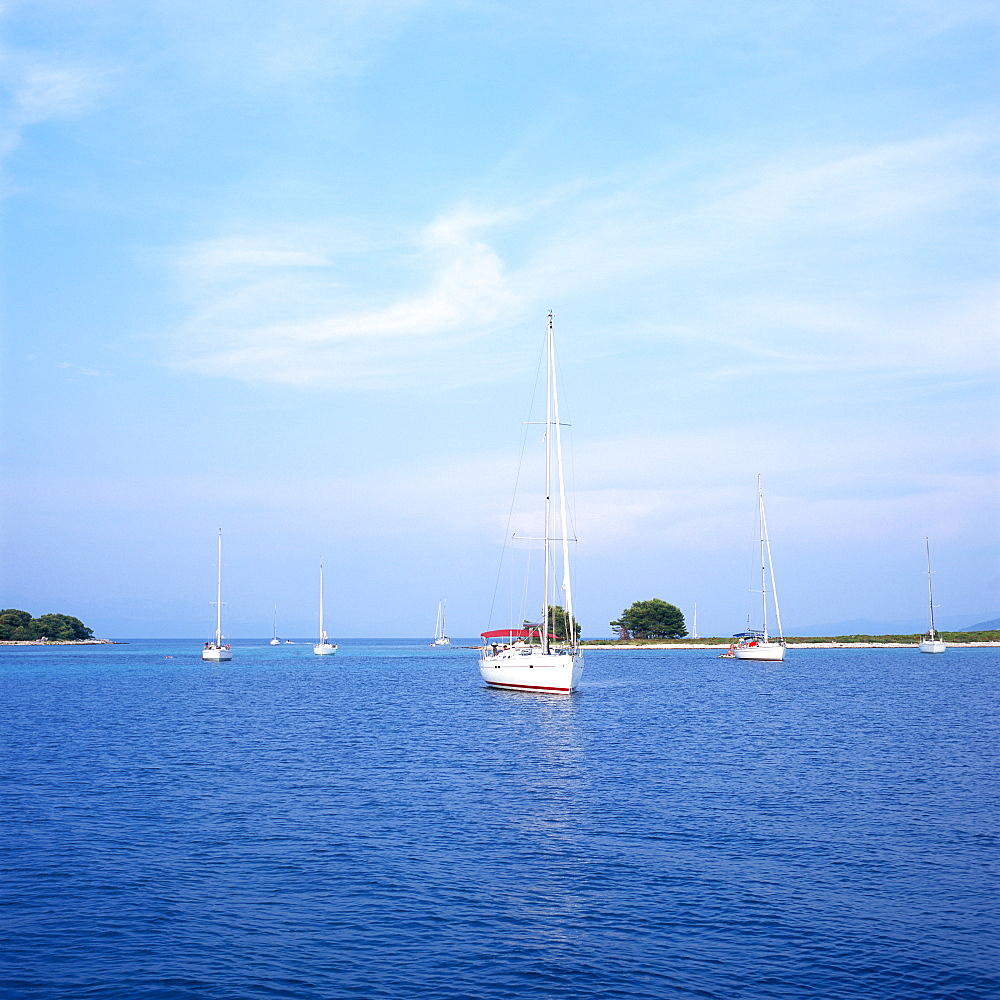 Sailboats anchoring in a bay, Dalmatia, Croatia