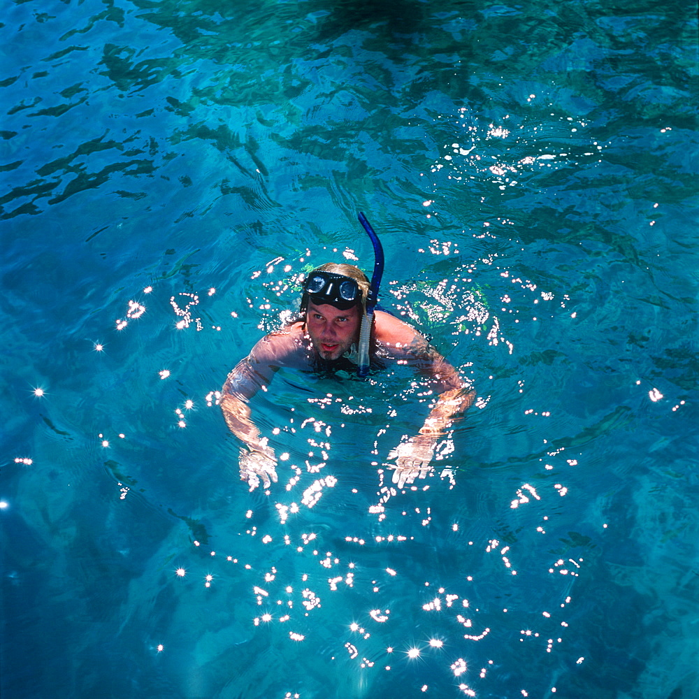 Man with diving goggles in the Adriatic Sea, Dalmatia, Croatia