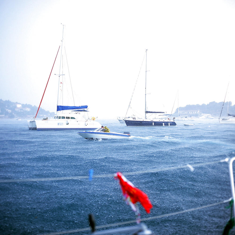 Sailboats in storm anchoring near Hvar, Dalmatia, Croatia