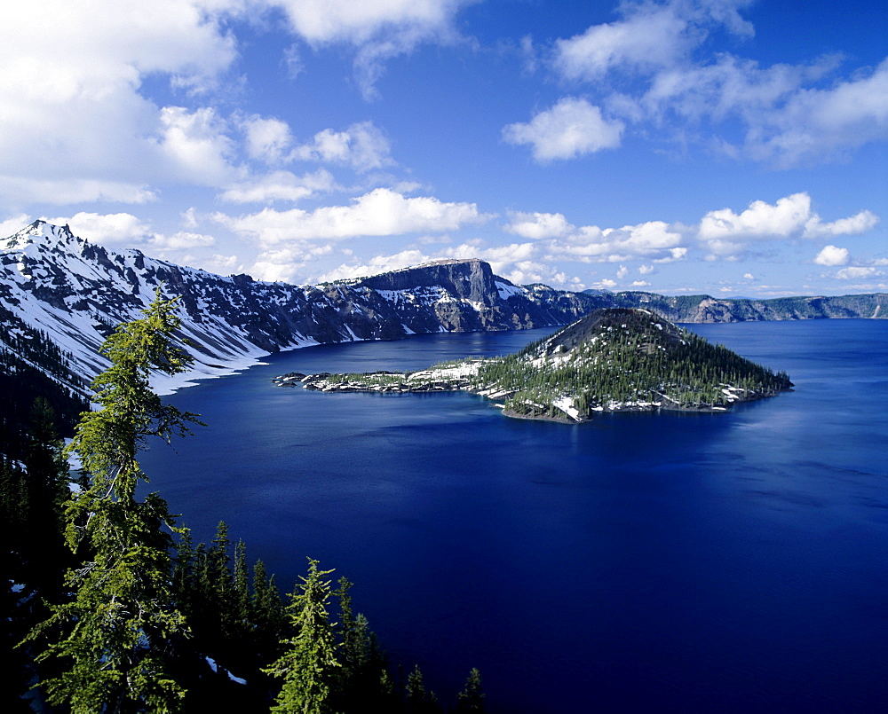 Oregon, Crater Lake National Park, Snowy Crater Lake and Wizard Island.