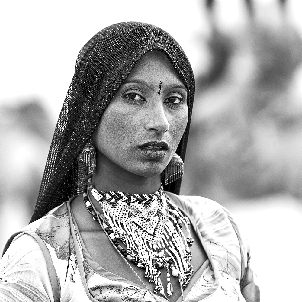 Portrait of a local tribeswoman in Sam sand dunes, near Jaisalmer, Damodara, Rajasthan, India