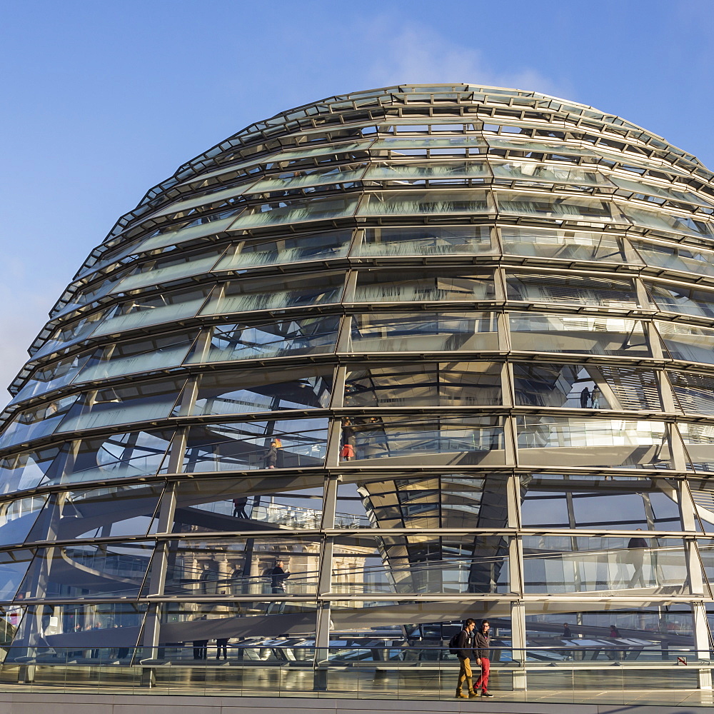 Reichstag dome exterior from its rooftop terrace, with passing visitors, early morning, Mitte, Berlin, Germany, Europe