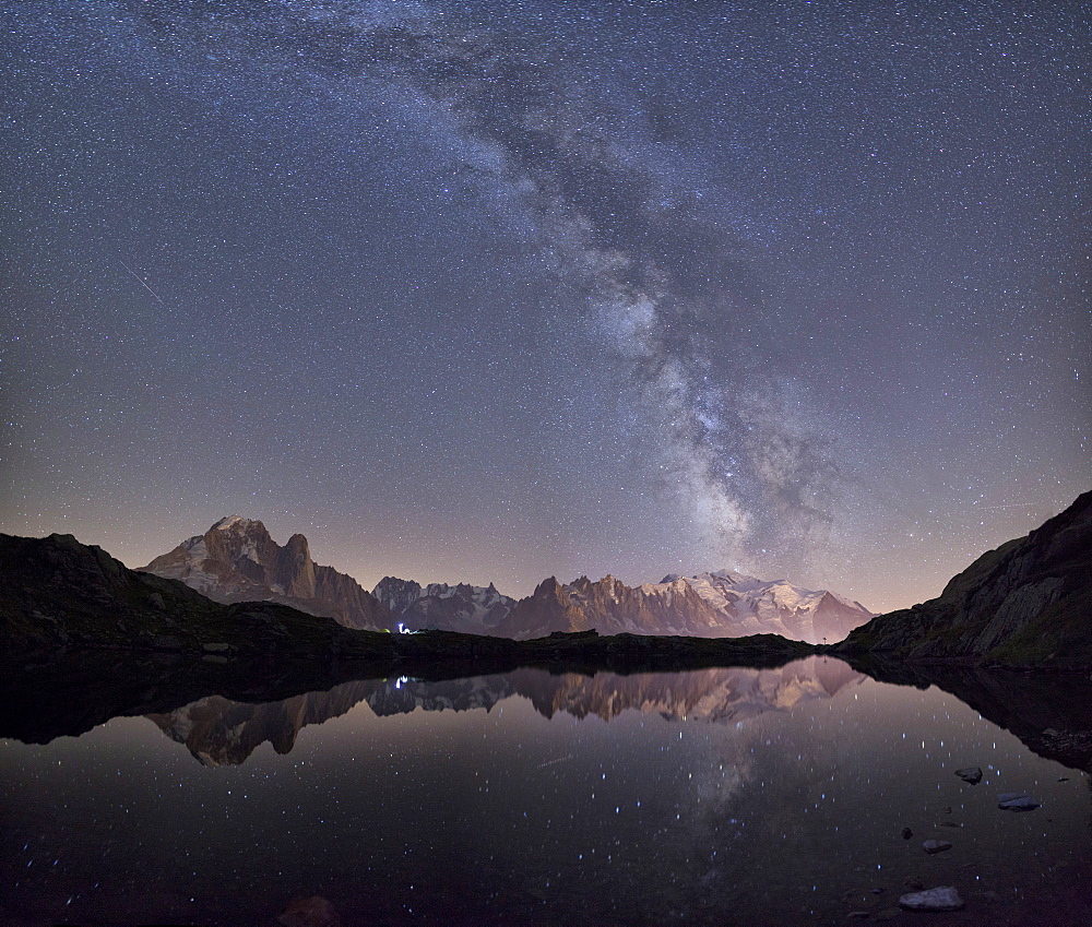 Starry sky over Mont Blanc range seen from Lac des Cheserys, Haute Savoie. French Alps, France, Europe