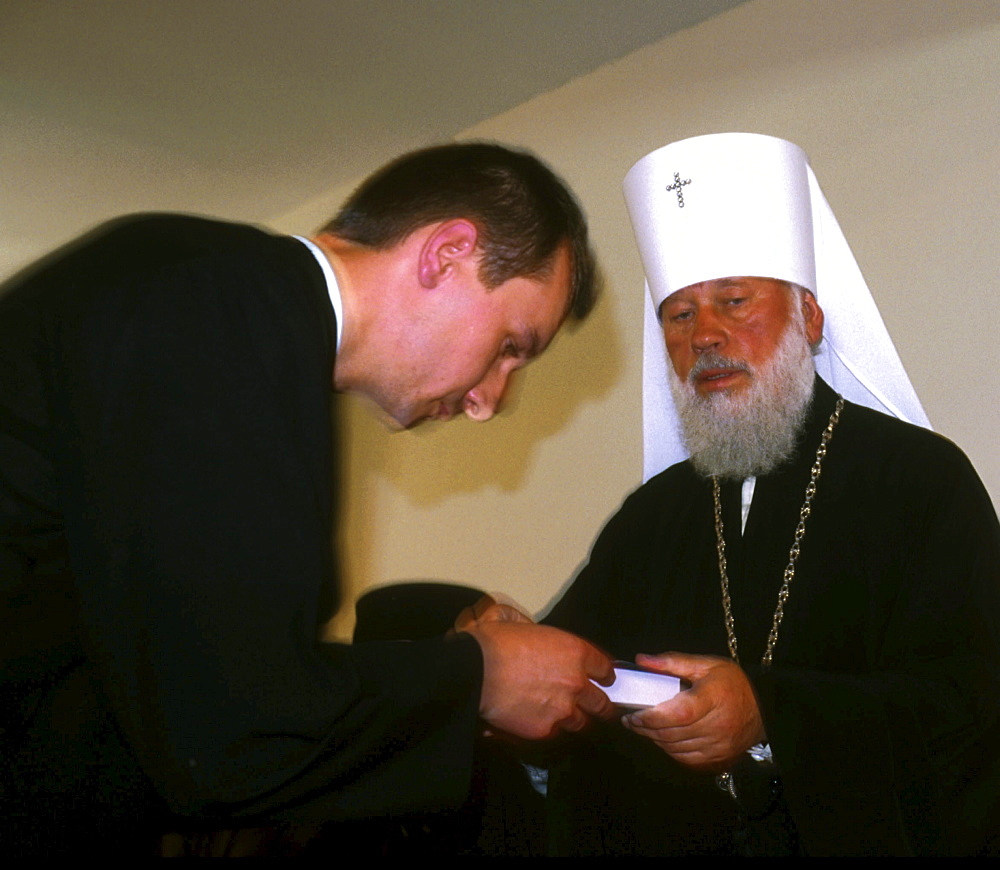 Ukraine - religion of ukrainian orthodox church presenting certificate to priest at seminary in