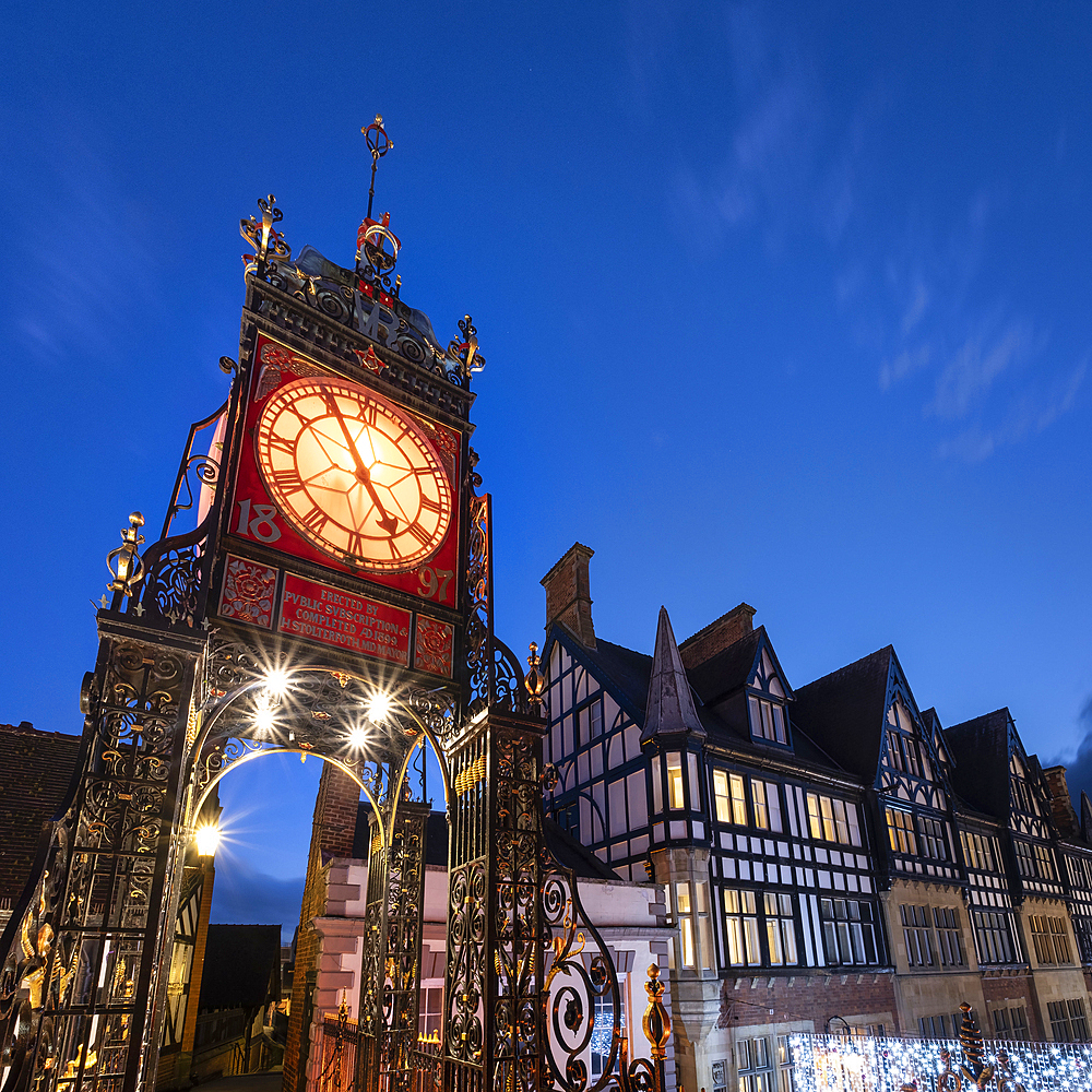 The Victorian Eastgate Clock on the city walls at night, Eastgate Street, Chester, Cheshire, England, United Kingdom, Europe