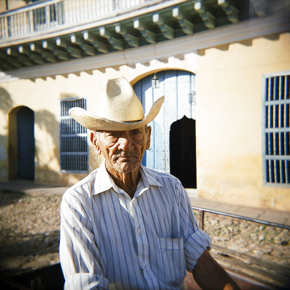 Portrait of an elderly cowboy, Trinidad, Cuba, West Indies, Central America