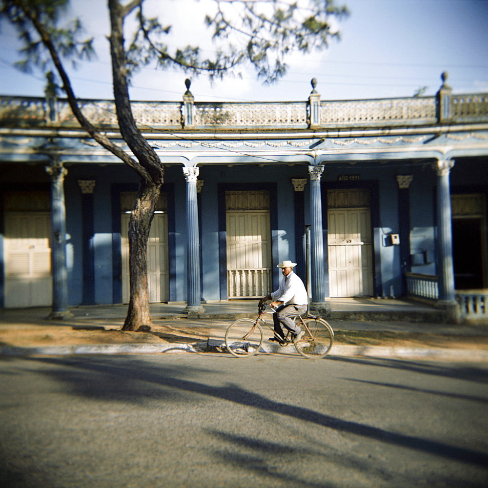 Street scene with man on bicycle, Vinales, Cuba, West Indies, Central America