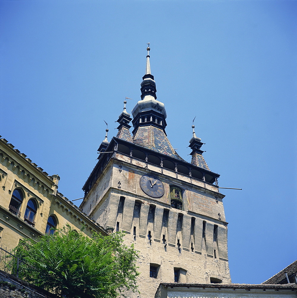 The 14th century Clock Tower with 1648 clock in the medieval citadel at Sighisoara, Transylvania, Romania, Europe