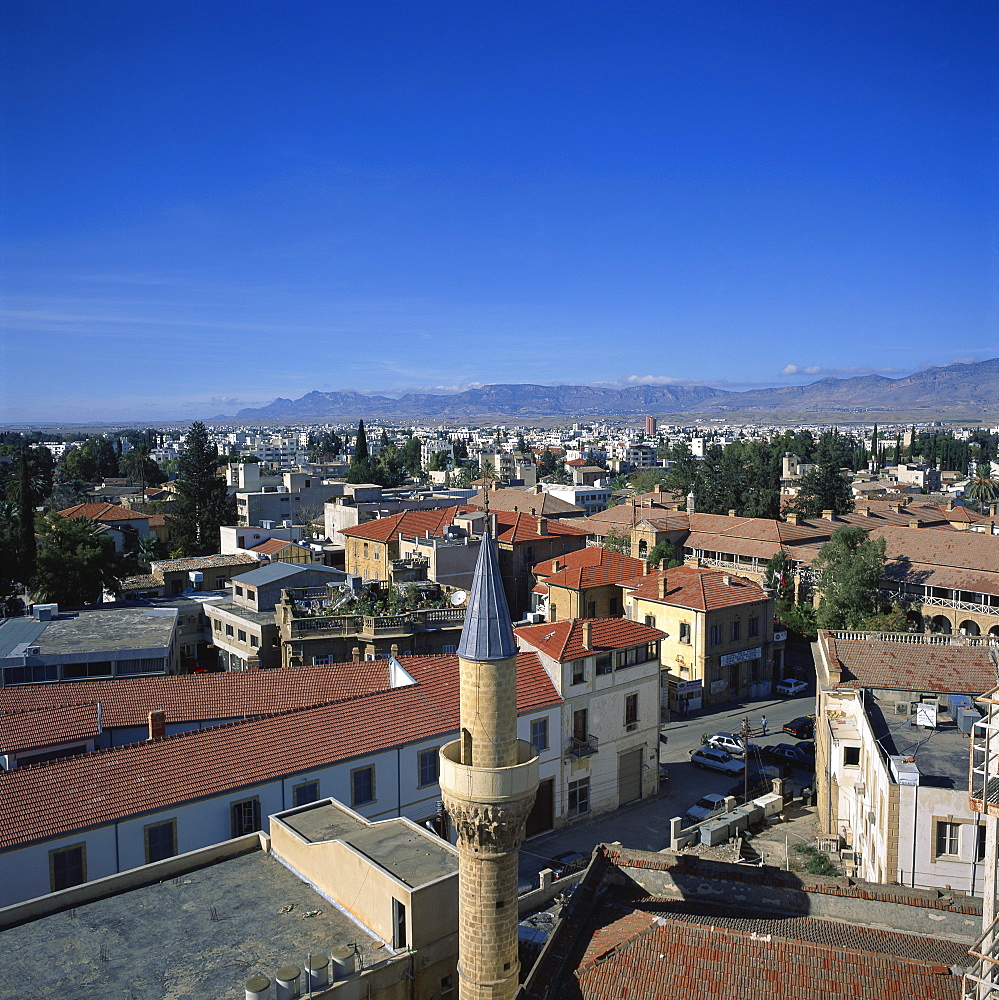 Minaret and skyline of Turkish Cypriot North Nicosia with Kyrenia mountains in distance, taken from Saray Hotel, Nicosia, North Cyprus, Europe