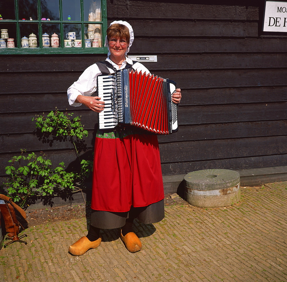 Lady in Dutch dress, Zaanse Schans, Holland, Europe