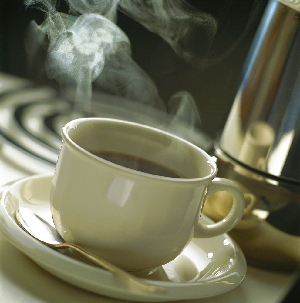 Cup of steaming coffee