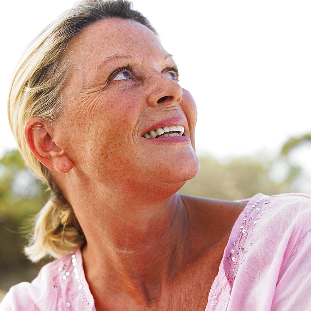 senior woman outdoors, close-up