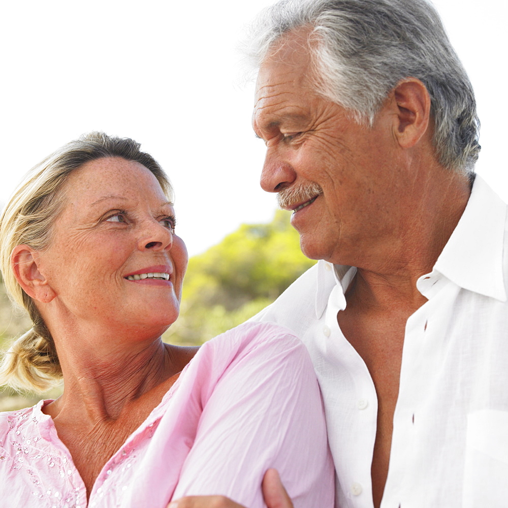 senior couple outdoors, close-up