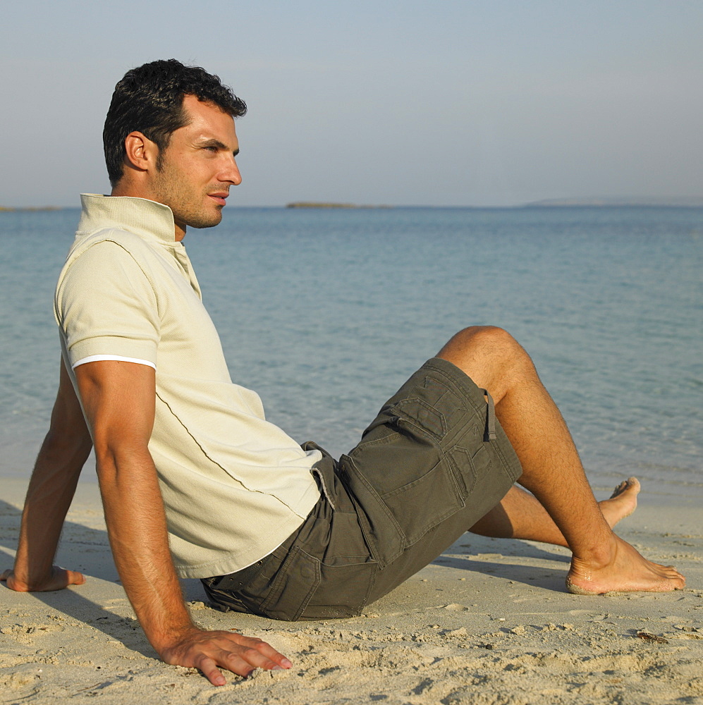 Man sitting on beach