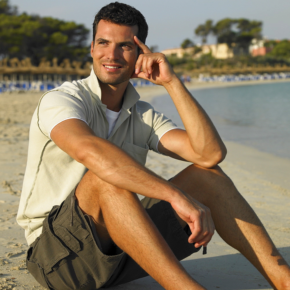 Man sitting on beach