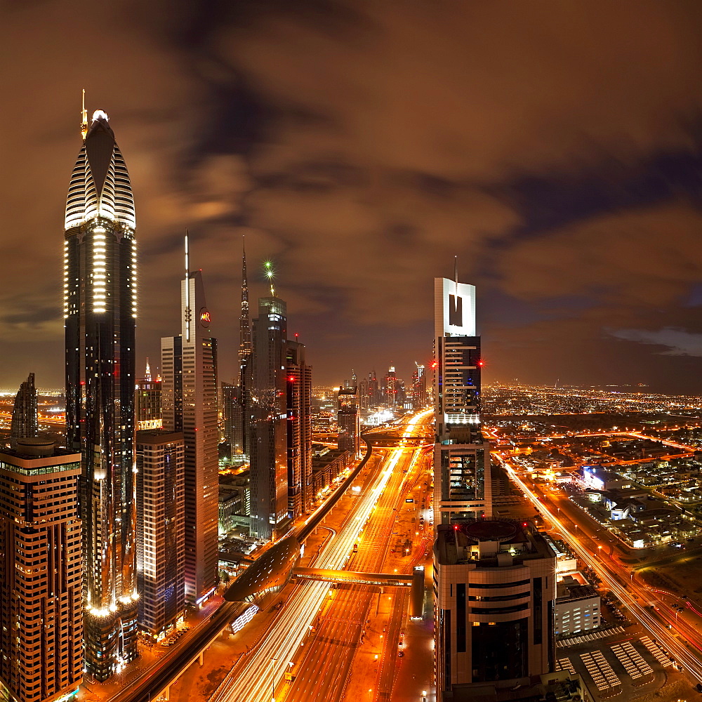 Elevated view over the modern Skyscrapers along Sheikh Zayed Road looking towards the Burj Kalifa, Dubai, United Arab Emirates, Middle East