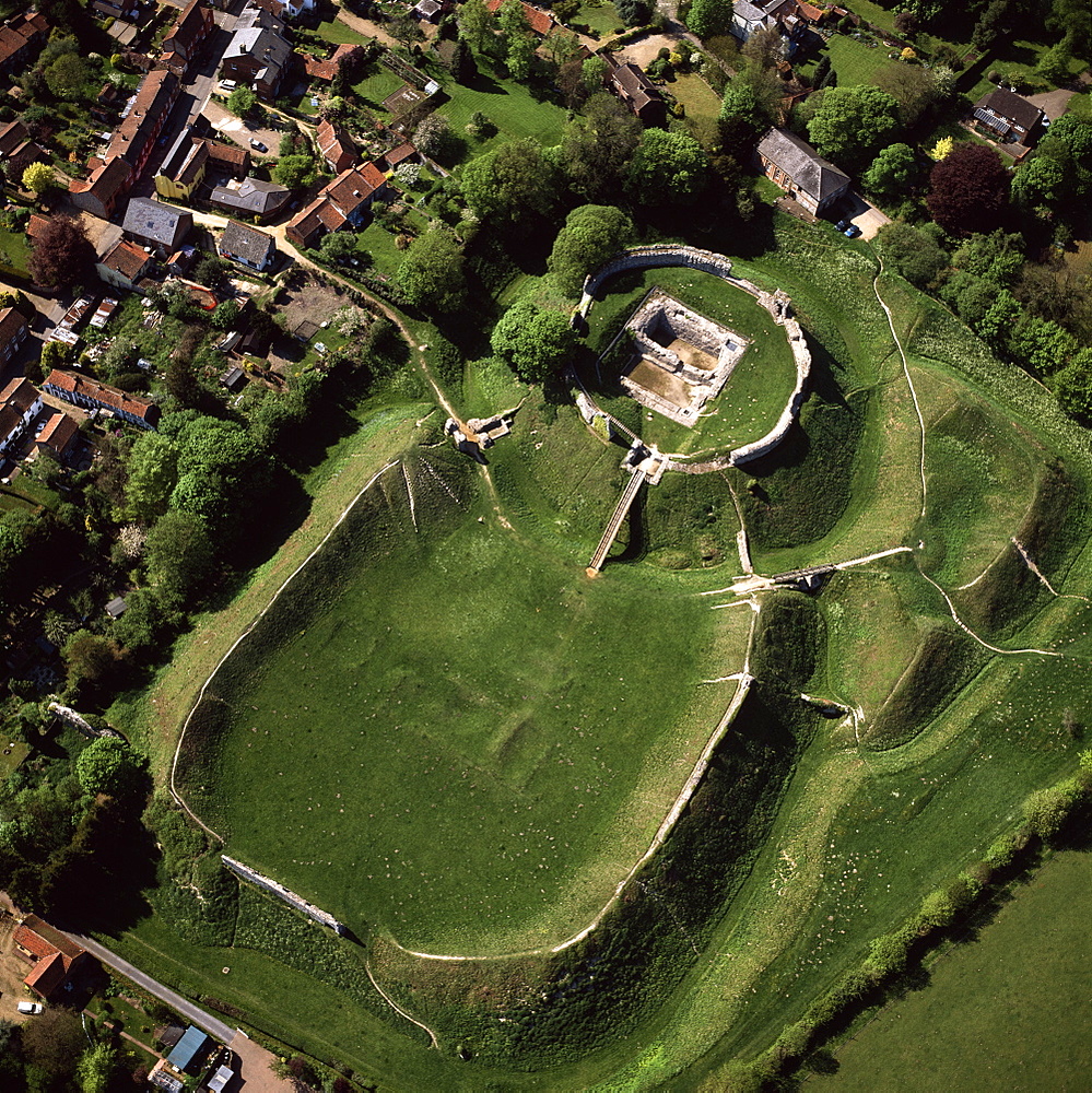 Aerial view of Castle Acre, remains of a motte and bailey castle with extensive earthworks, Castle Acre, Norfolk, England, United Kingdom, Europe