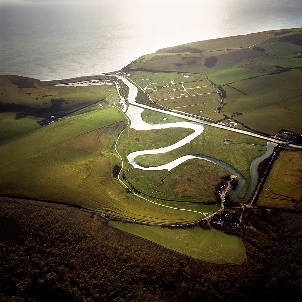 Aerial image of the Cuckmere River at Cuckmere Haven, Seven Sisters Country Park, East Sussex, England, United Kingdom, Europe