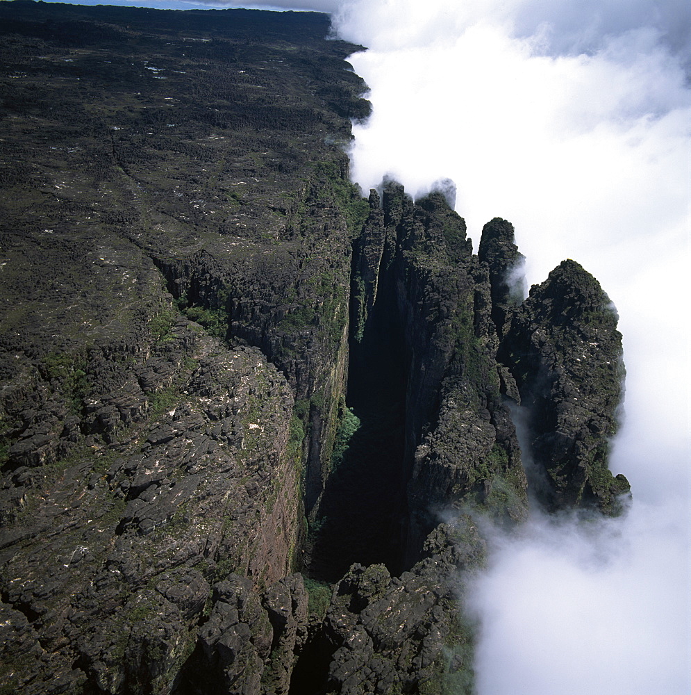 Aerial image of tepuis showing the Great Crack and summit of Mount Kukenaam (Kukenan) (Cuguenan),  Estado Bolivar, Venezuela, South America