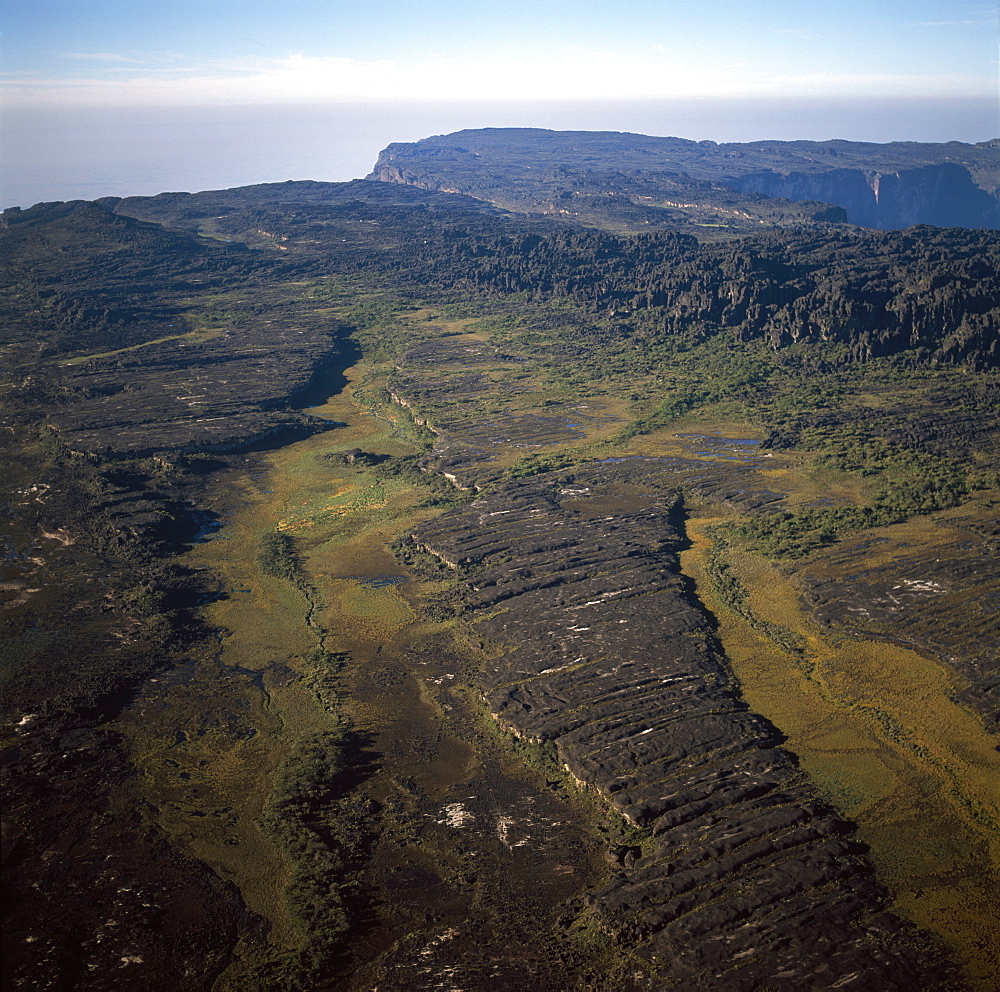 Aerial image of tepuis showing swamps and rock labyrinths on summit plateau in Brazilian and Guyanese sectors, Mount Roraima, Venezuela, South America