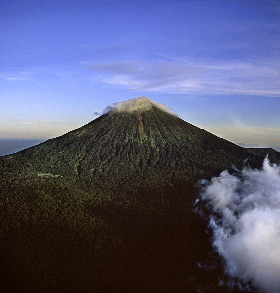 Aerial view of Mount Karisimbi, a dormant volcano in the Virunga Mountains on the border between Rwanda and the Democratic Republic of Congo (DRC), at 4507m the highest of the mountain range, Great Rift Valley, Africa