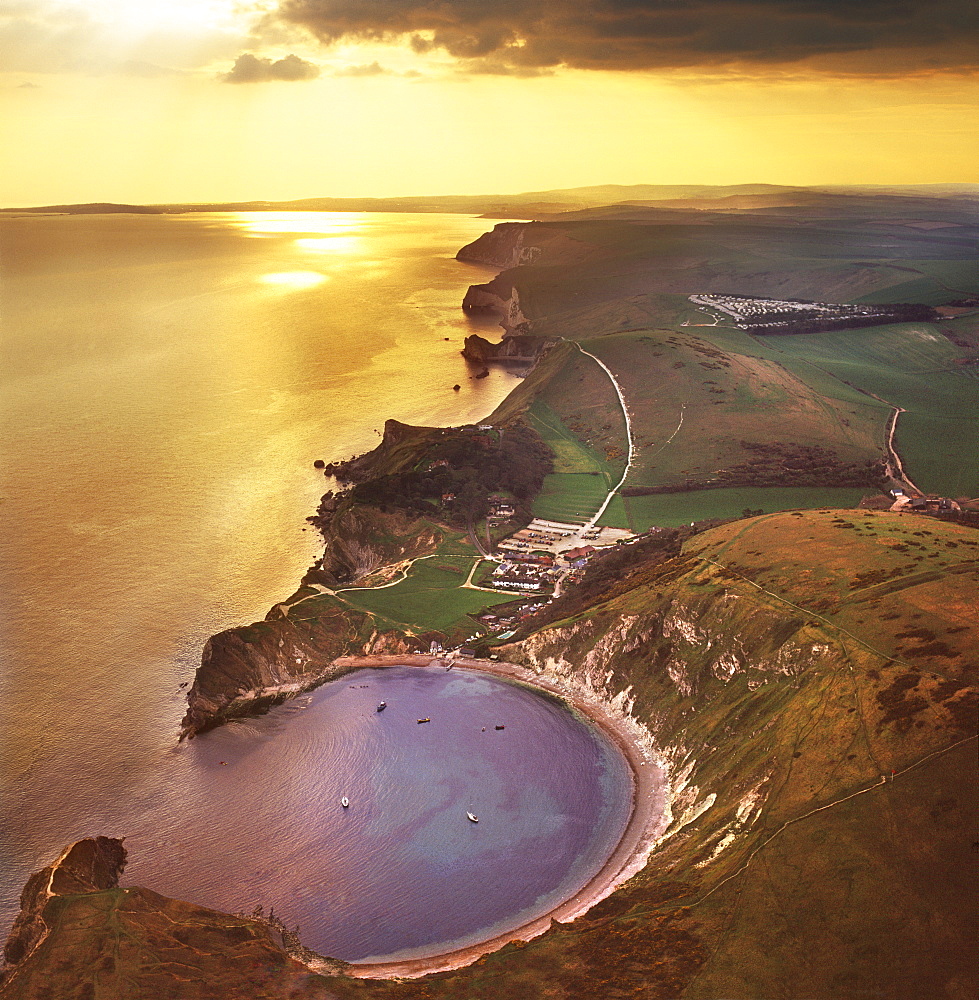 Aerial image of Lulworth Cove, a natural landform harbour, near West Lulworth, on the Jurassic Coast, UNESCO World Heritage Site, Dorset, England, United Kingdom, Europe