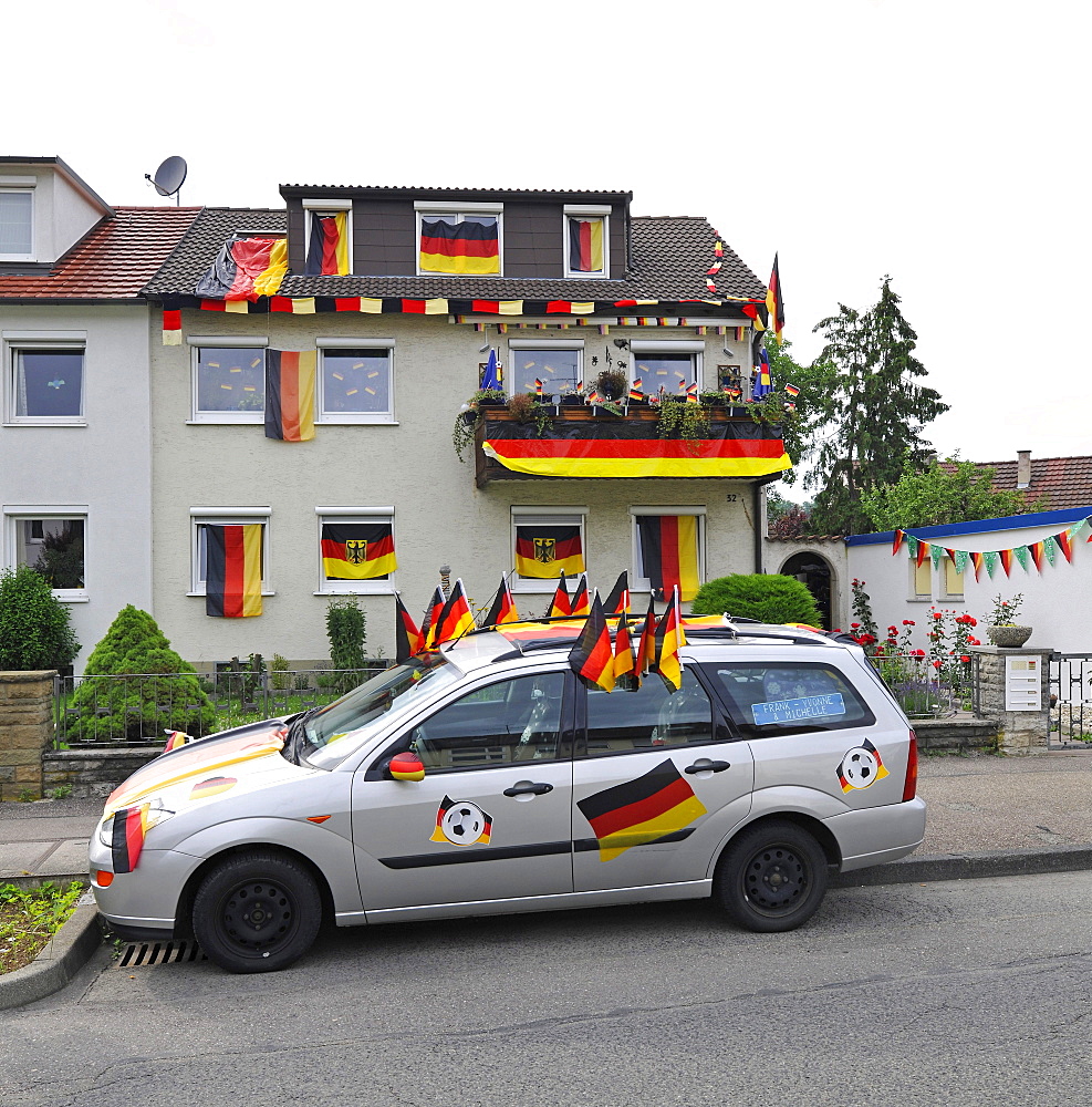 House and car decorated with German flags during Football World Cup 2010, Stuttgart, Baden-Wuerttemberg, Germany, Europe