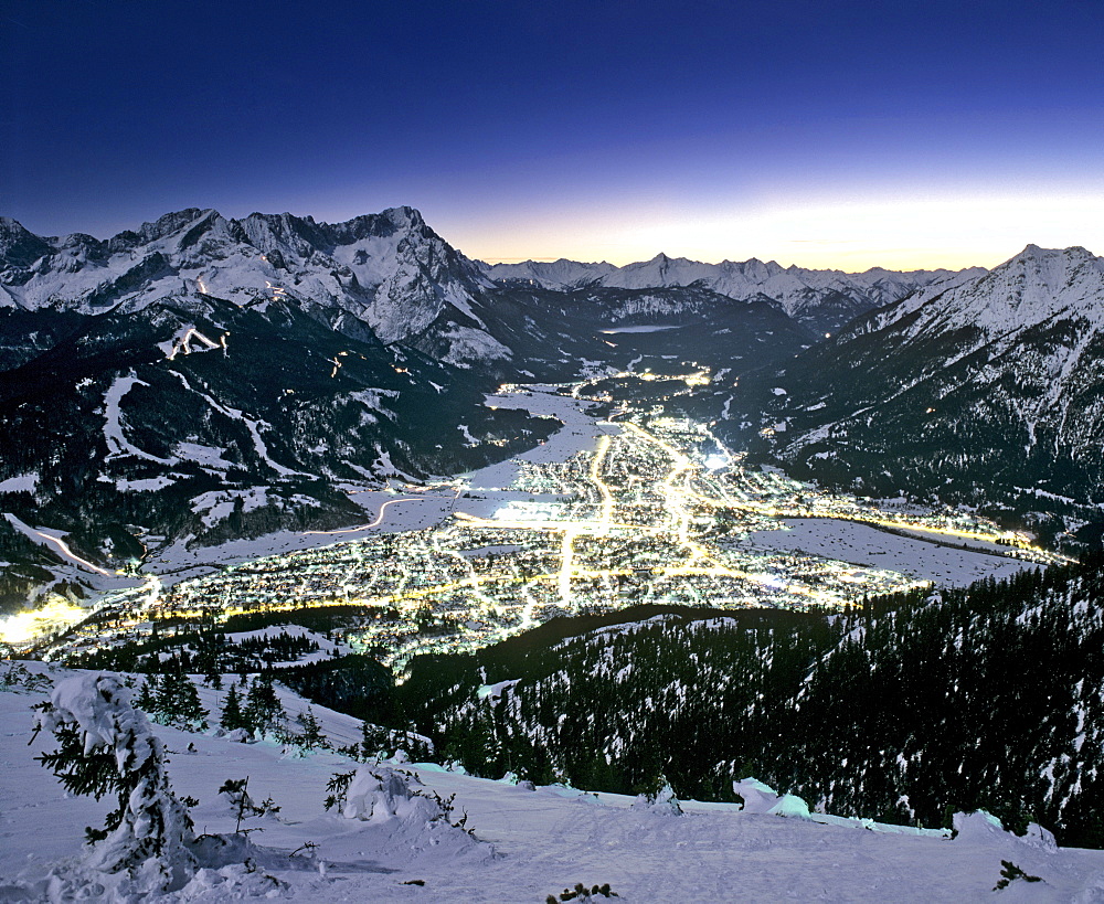 View from Mount Wank, night shot, Garmisch-Partenkirchen's town lights, Wetterstein Range, Werdenfels, Upper Bavaria, Bavaria, Germany