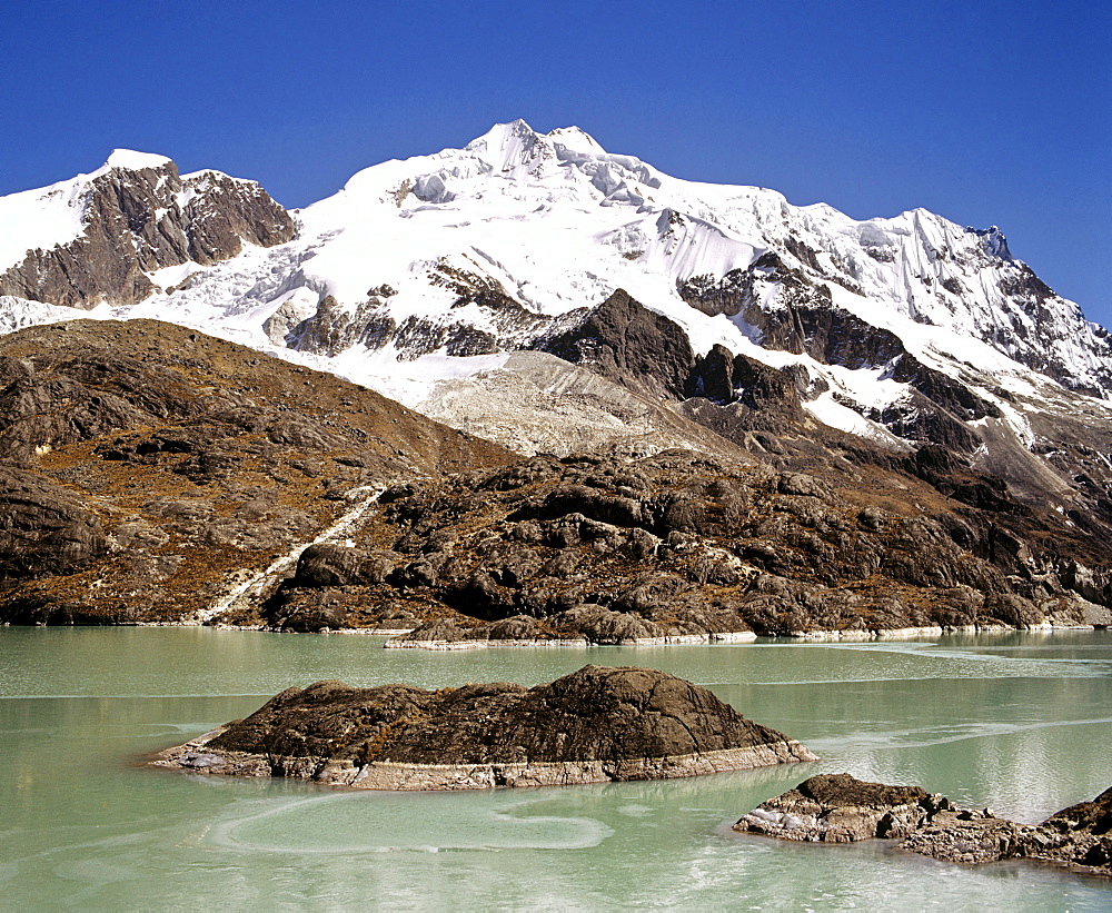 Mt. Huayna Potosi viewed from the reservoir at Zongo Pass, Cordillera Real, La Paz, the Andes, Bolivia