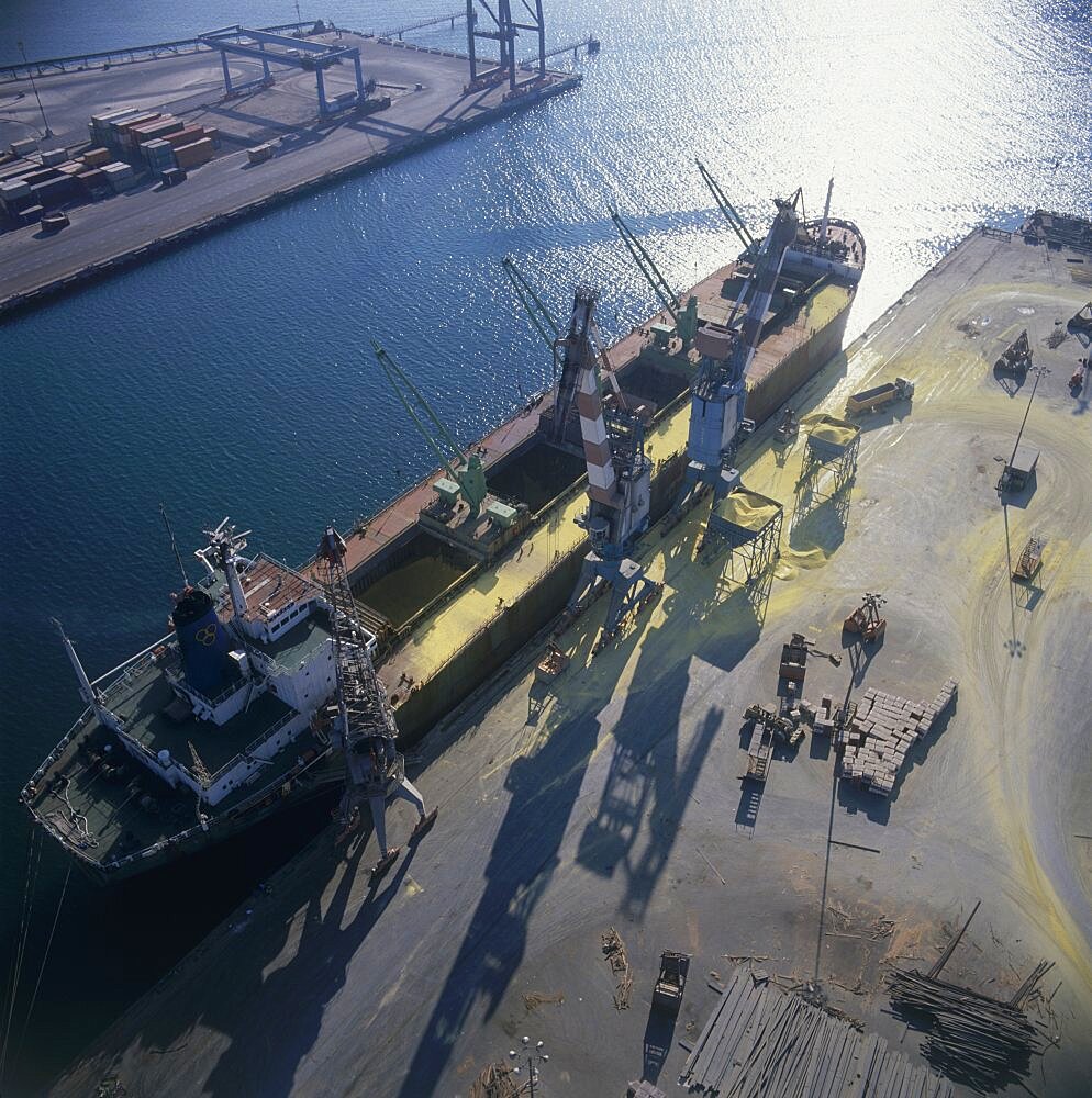 Aerial photograph of A ship unloads its cargo at Ashdod Port, Israel