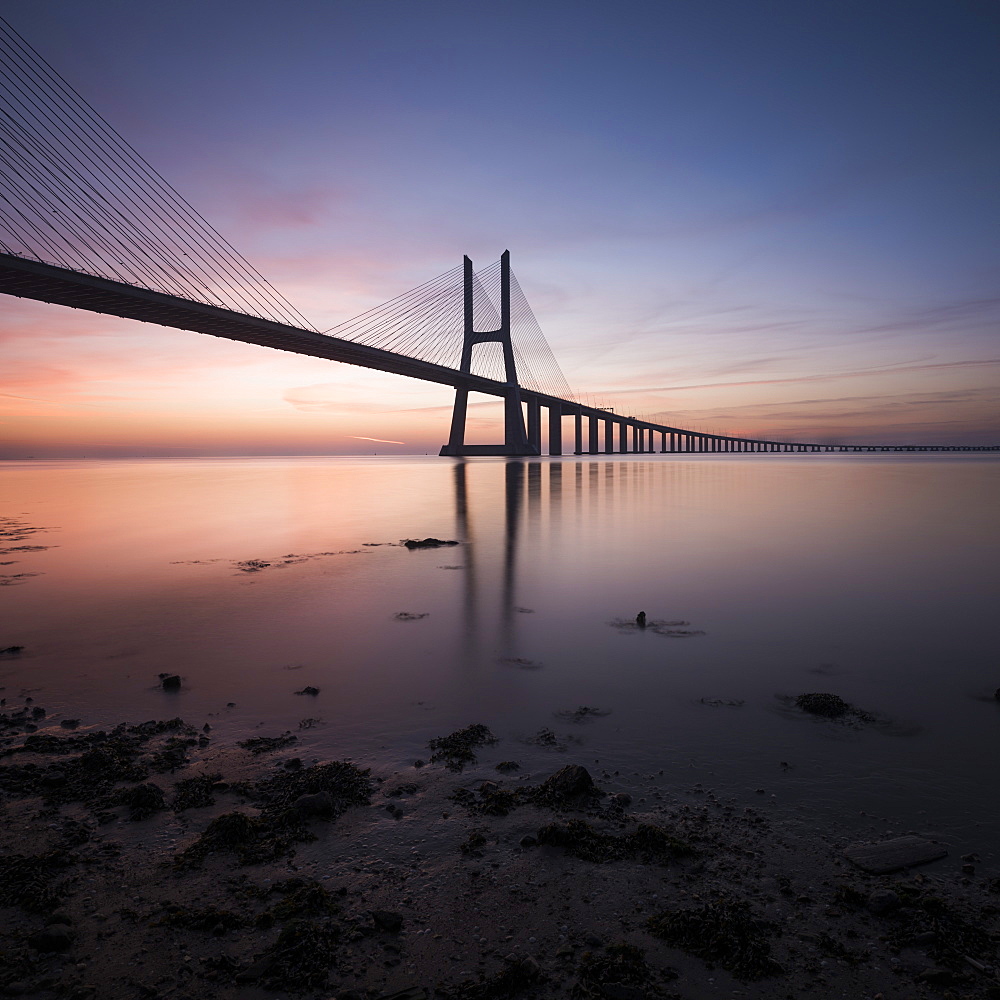 Vasco da Gama Bridge over Rio Tejo (Tagus River) at dawn, Lisbon, Portugal, Europe