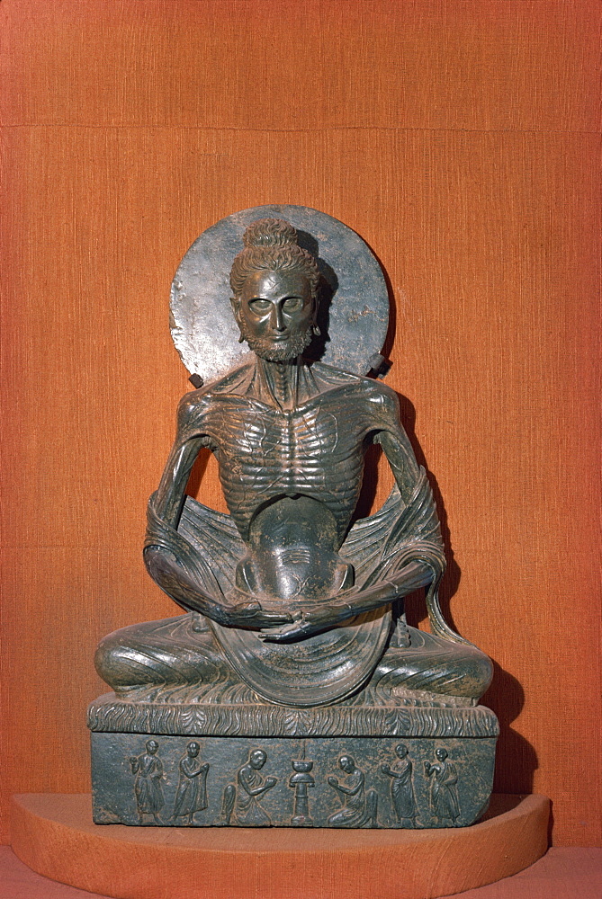 Statue of the fasting or emaciated Buddha in the Museum at Lahore, Pakistan, Asia