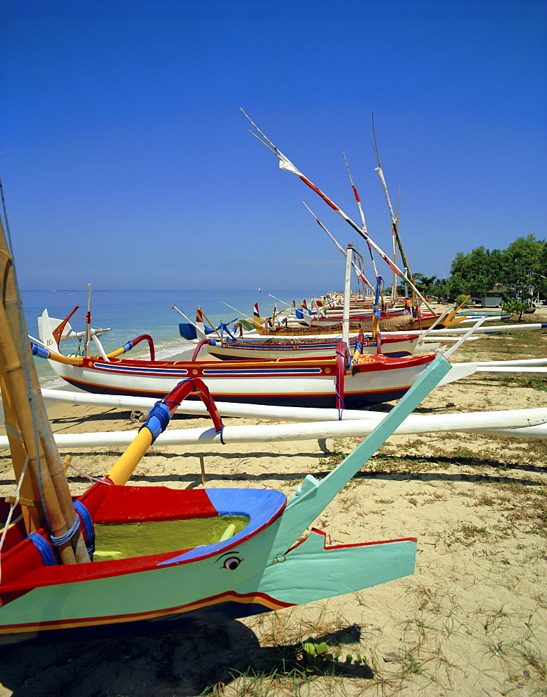 Prahu, colourful local boats, on Sanur beach, Bali, Indonesia