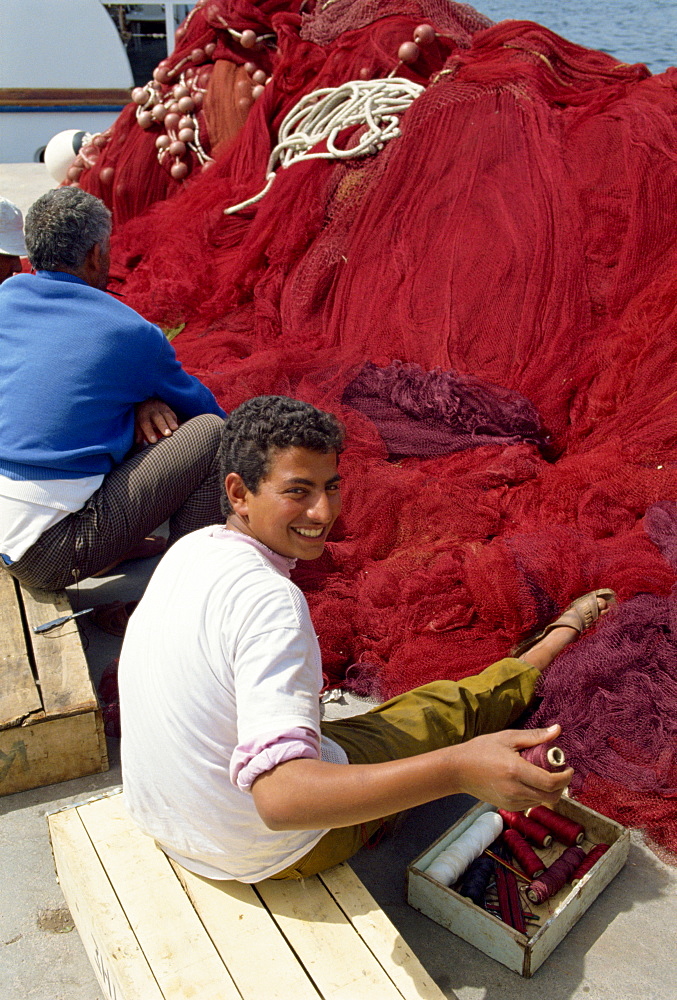 Mending fishing nets, Agios Nikolas, Crete, Greek Islands, Greece, Europe