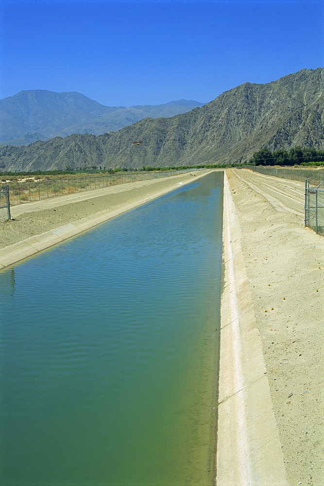 Irrigation canal with water from the Colorado River, Palm Springs area, California, United States of America, North America