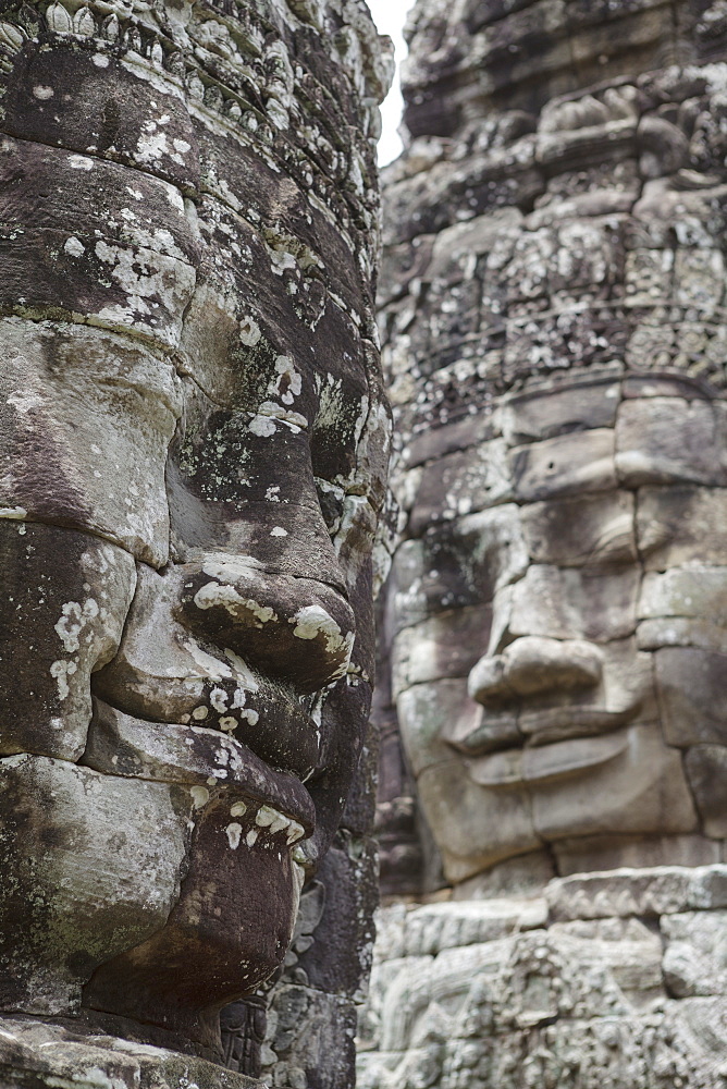 Smiling faces carved in stone, Bayon, Angkor, UNESCO World Heritage Site, Siem Reap, Cambodia, Indochina, Southeast Asia, Asia