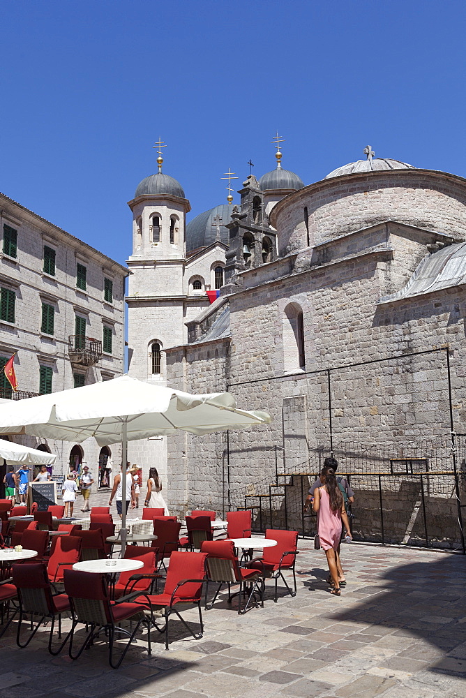 Cafes and tourists in Cathedral Square, Kotor Old Town, UNESCO World Heritage Site, Montenegro, Europe 