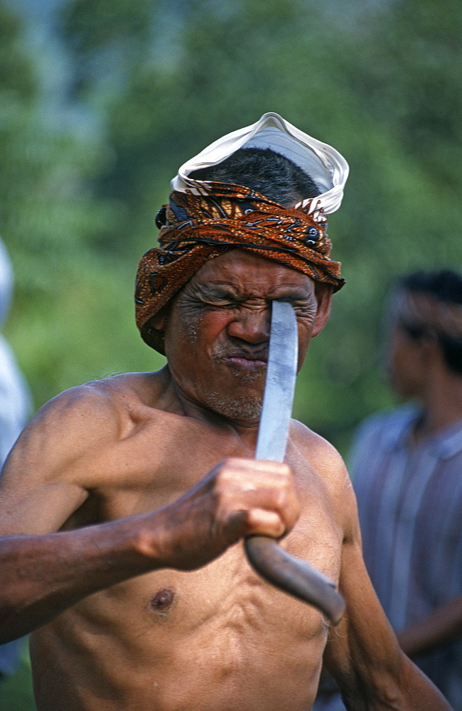 Traditional Debus performer at Kasephuan annual rice festival Seren Tahun, West Java, Indonesia