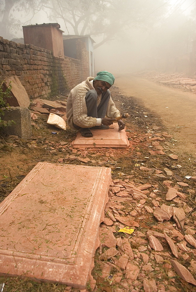 Stone mason carving relief for Taj Mahal repairs and restoration, Agra, Uttar Pradesh, India