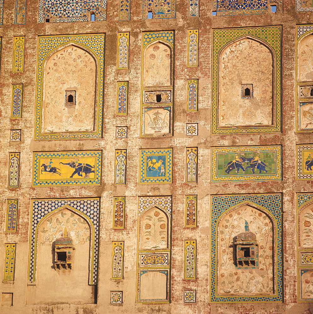 Close-up of decorative tiles on a brick building in Lahore, Pakistan, Asia