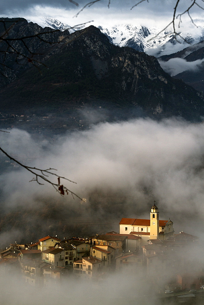 Village of La Bollene Vesubie in the evening mist in the Maritime Alps (Alpes Maritimes), France, Europe