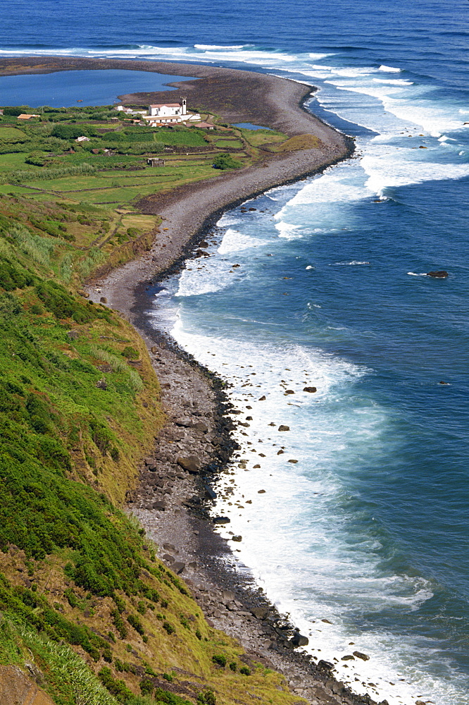 Low aerial of the coastline at Faja dos Tijulos on the north coast of the island of Sao Jorge in the Azores, Portugal, Atlantic Ocean, Europe