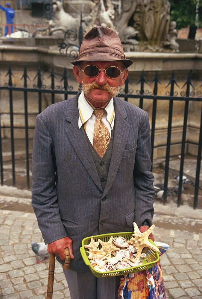 Man selling seashells, Gdansk, Pomerania, Poland, Europe